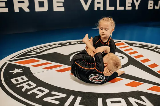 A young student training on the Verde Valley logo