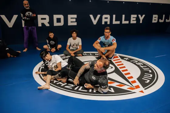 Open mat session on the Verde Valley logo