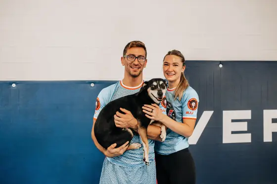 Coach Clay Wimer with the gym dog